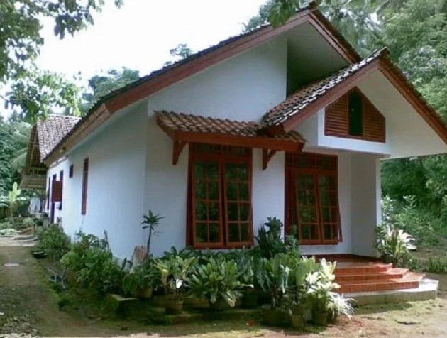 Rumah dengan Taman Depan yang Luas